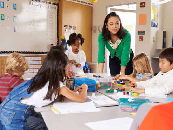 A substitute teacher teaching a class.